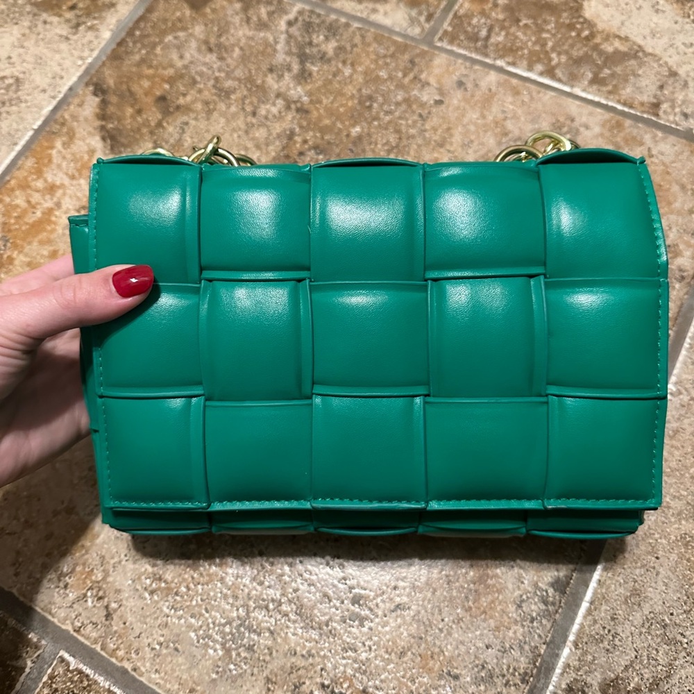 Green woven leather handbag